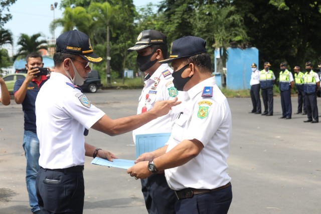 Apel serah terima pengelolaan Terminal Amplas dan Pinang Baris. (mimbar/ist)