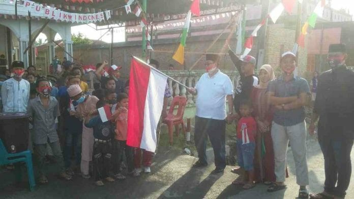 Juliadi melepas peserta gerak jalan santai khusus anak di Binjai. (ist)